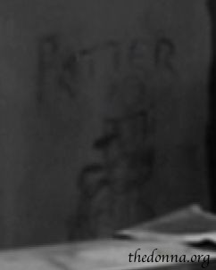 Potters Wheelchair drawing on stairway wall.
